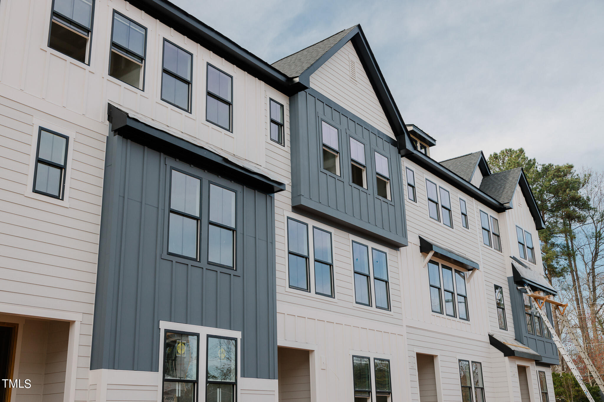 6403 Tanner Oak Lane Raleigh, NC 27613 - Photo 4 of 35 a building view