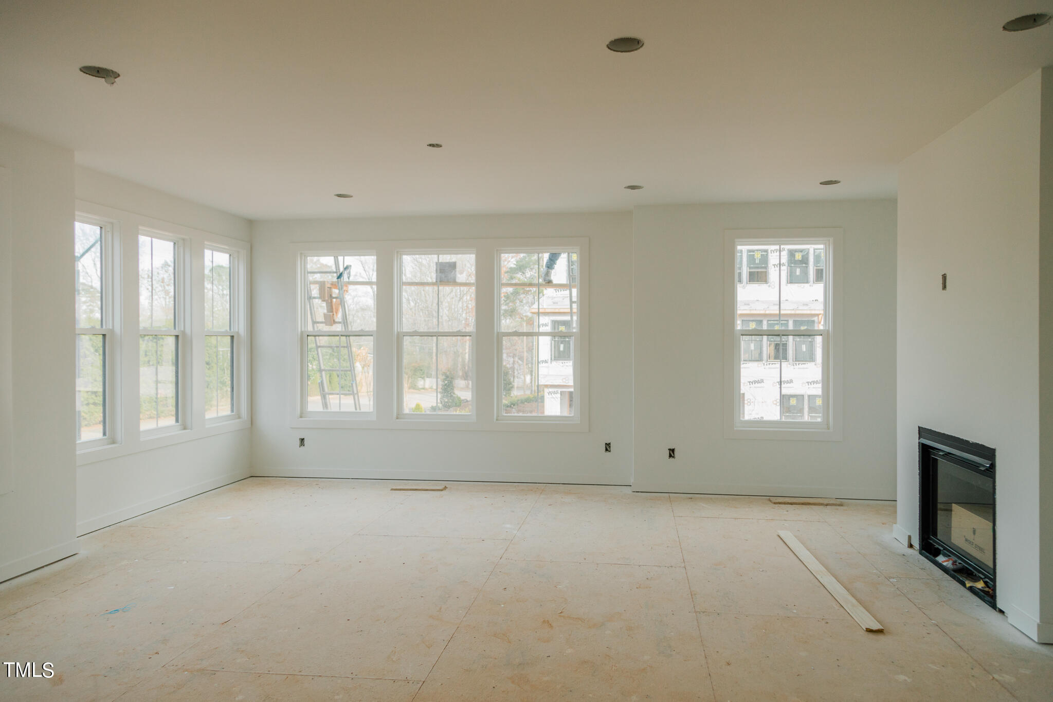 6403 Tanner Oak Lane Raleigh, NC 27613 - Photo 10 of 35 a view of an empty room with a window