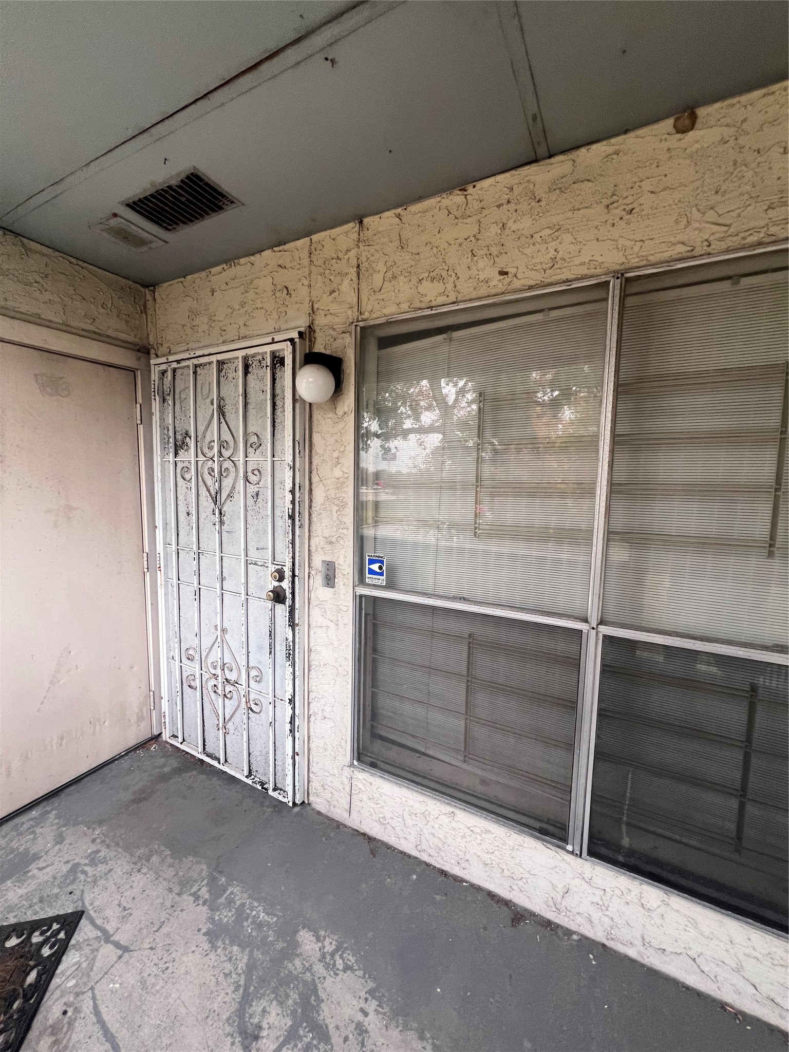 7313 Gulf Freeway, Unit 123 Houston, TX 77017 - Photo 2 of 13 a view of an empty room with a fireplace