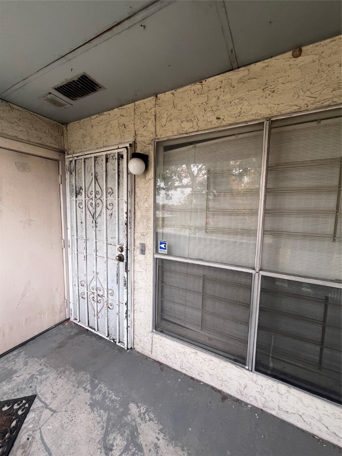 7313 Gulf Freeway, Unit 123 Houston, TX 77017 - Photo 2 of 13 a view of an empty room with a fireplace
