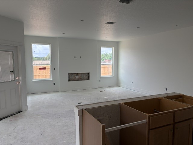 544 Gus Loop Georgetown, TX 78626 - Photo 4 of 22 a kitchen with a sink cabinets and window