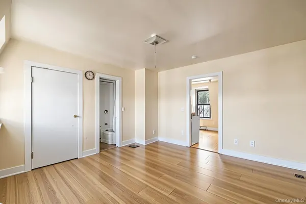 a view of a livingroom with wooden floor