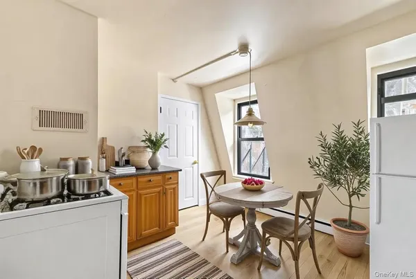 a workspace with furniture and window