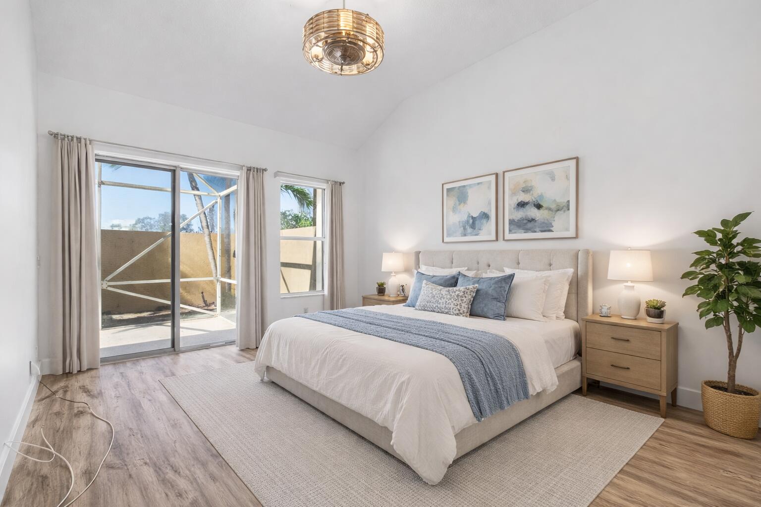 7848 Travelers Tree Drive Boca Raton, FL 33433 - Photo 22 of 60 a bedroom with a bed and a potted plant