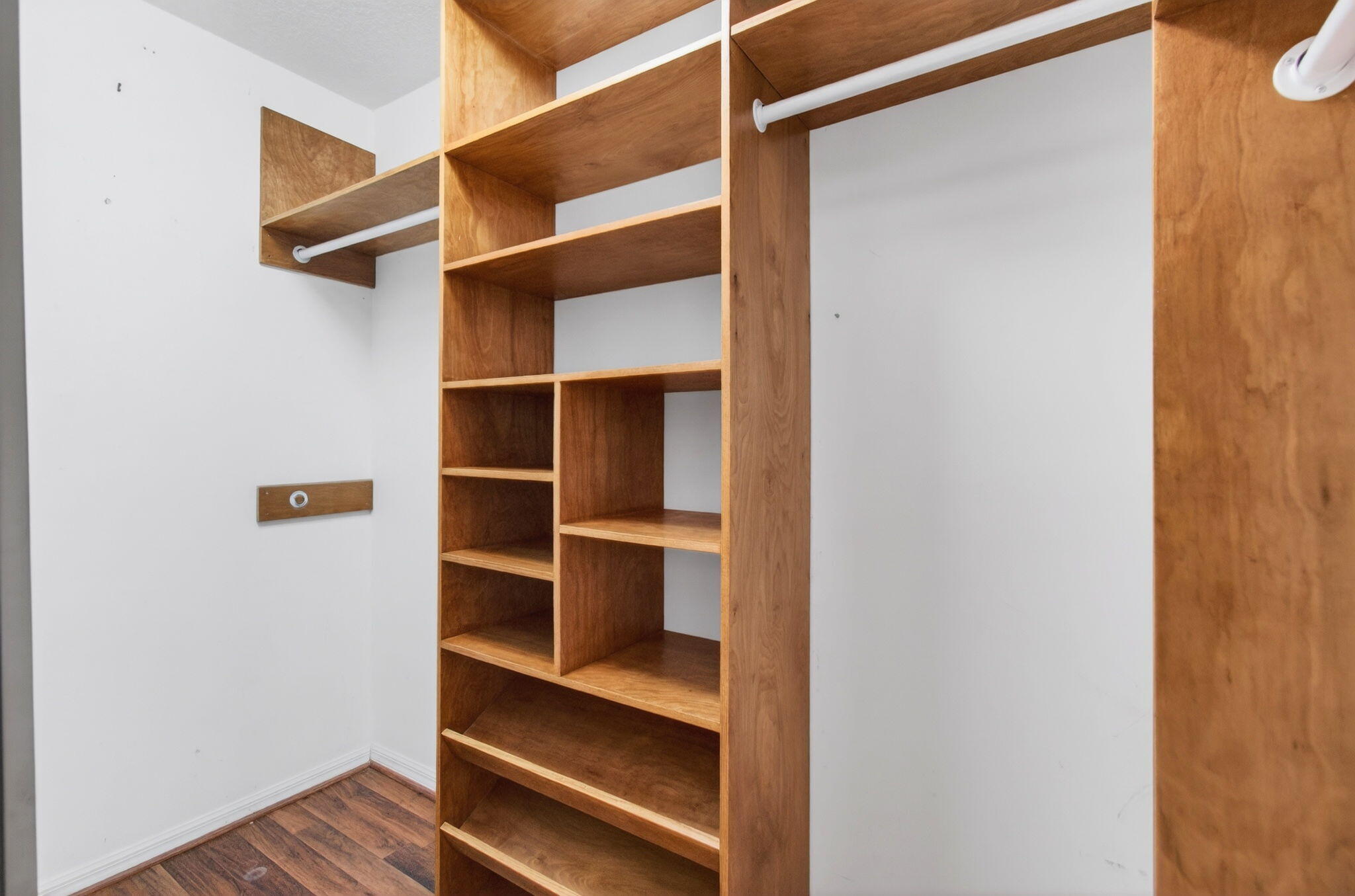 7848 Travelers Tree Drive Boca Raton, FL 33433 - Photo 30 of 60 a view of walk in closet with empty racks