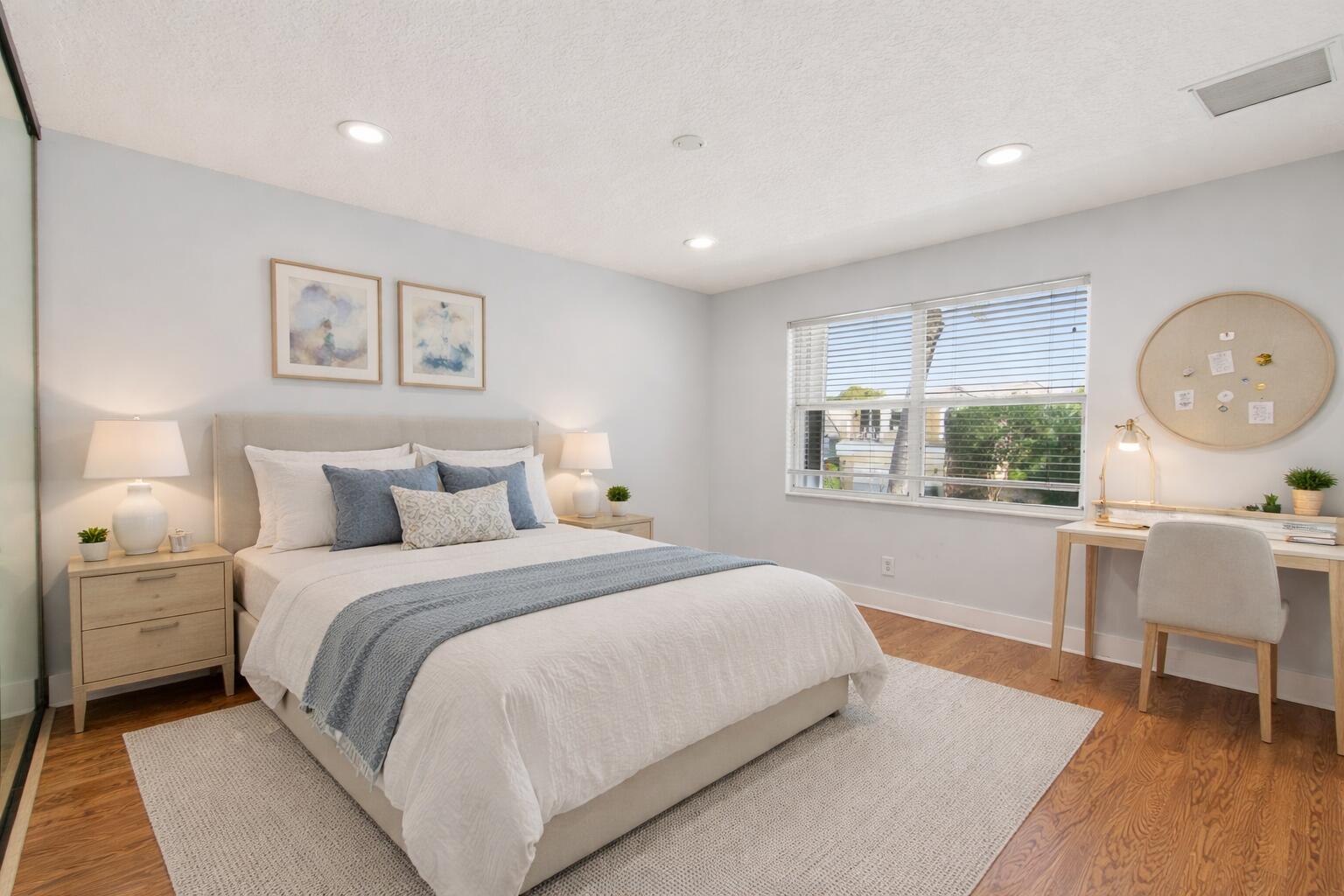 7848 Travelers Tree Drive Boca Raton, FL 33433 - Photo 40 of 60 a bedroom with a large bed and a window