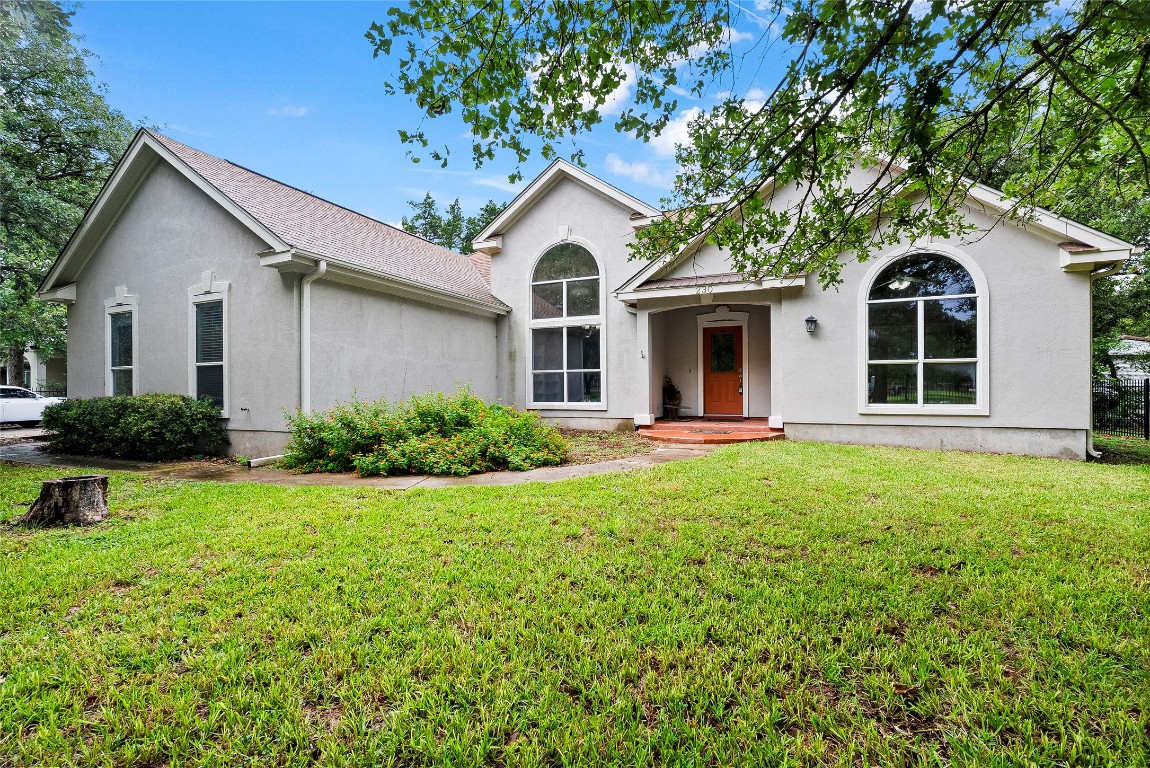 230 Cedar Hills Drive Elgin, TX 78621 - Photo 1 of 40 a front view of a house with a yard and porch