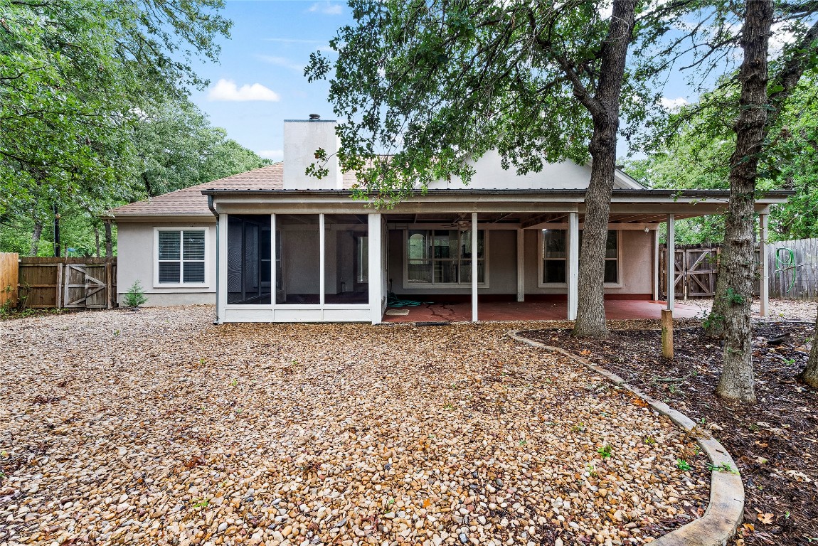 230 Cedar Hills Drive Elgin, TX 78621 - Photo 24 of 40 a house with trees in the background