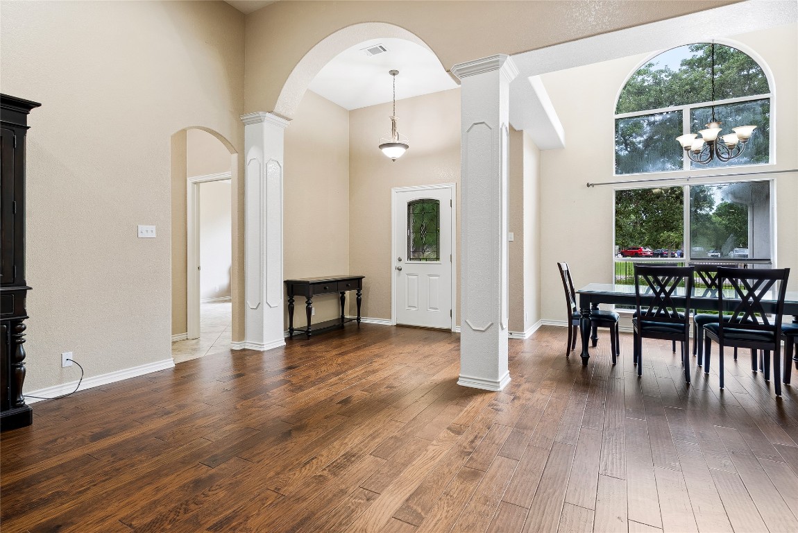 230 Cedar Hills Drive Elgin, TX 78621 - Photo 9 of 40 a view of a dining room with furniture window and wooden floor