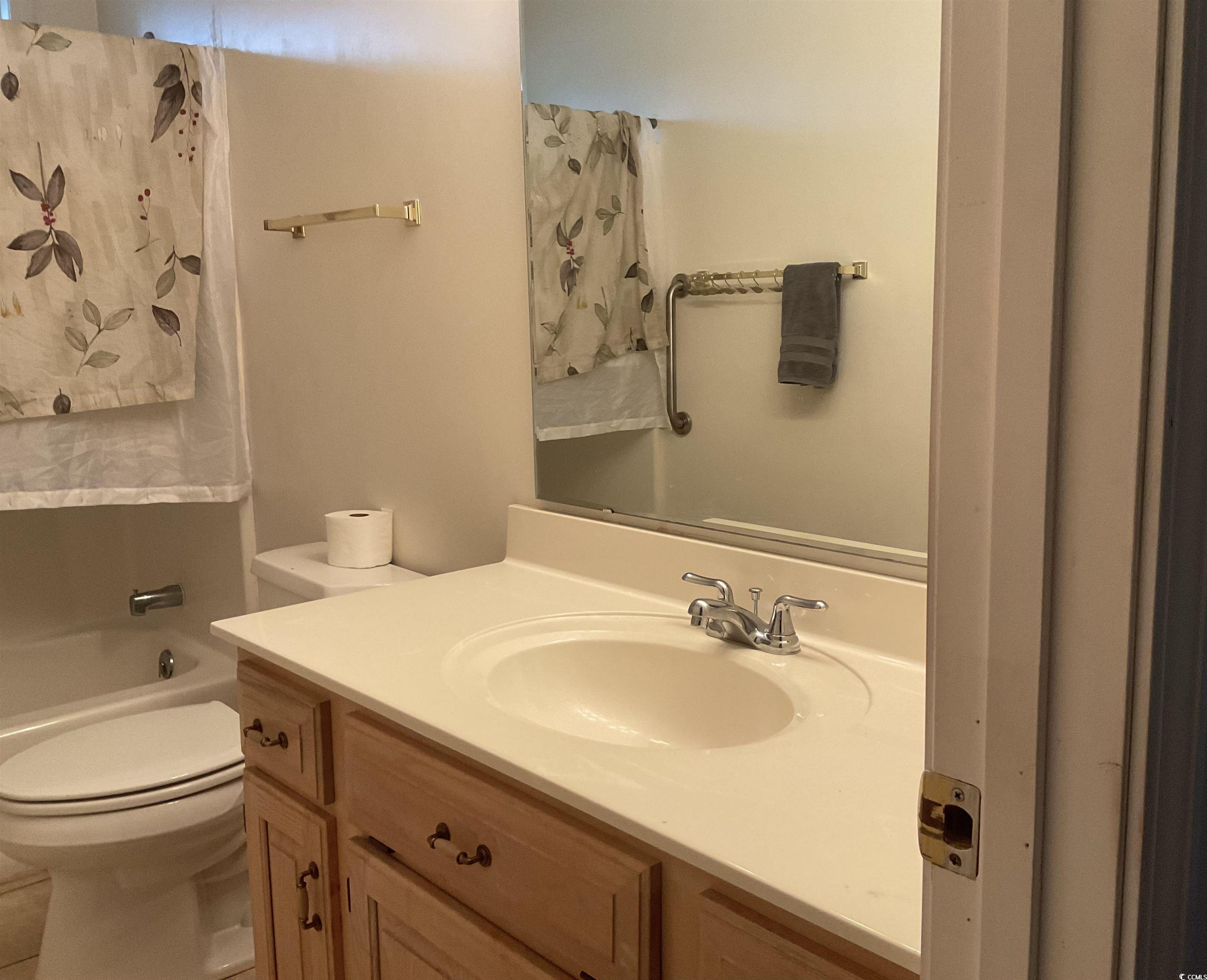 617 Waccamaw River Road Myrtle Beach, SC 29588 - Photo 12 of 17 Full bathroom with vanity and shower / tub combo