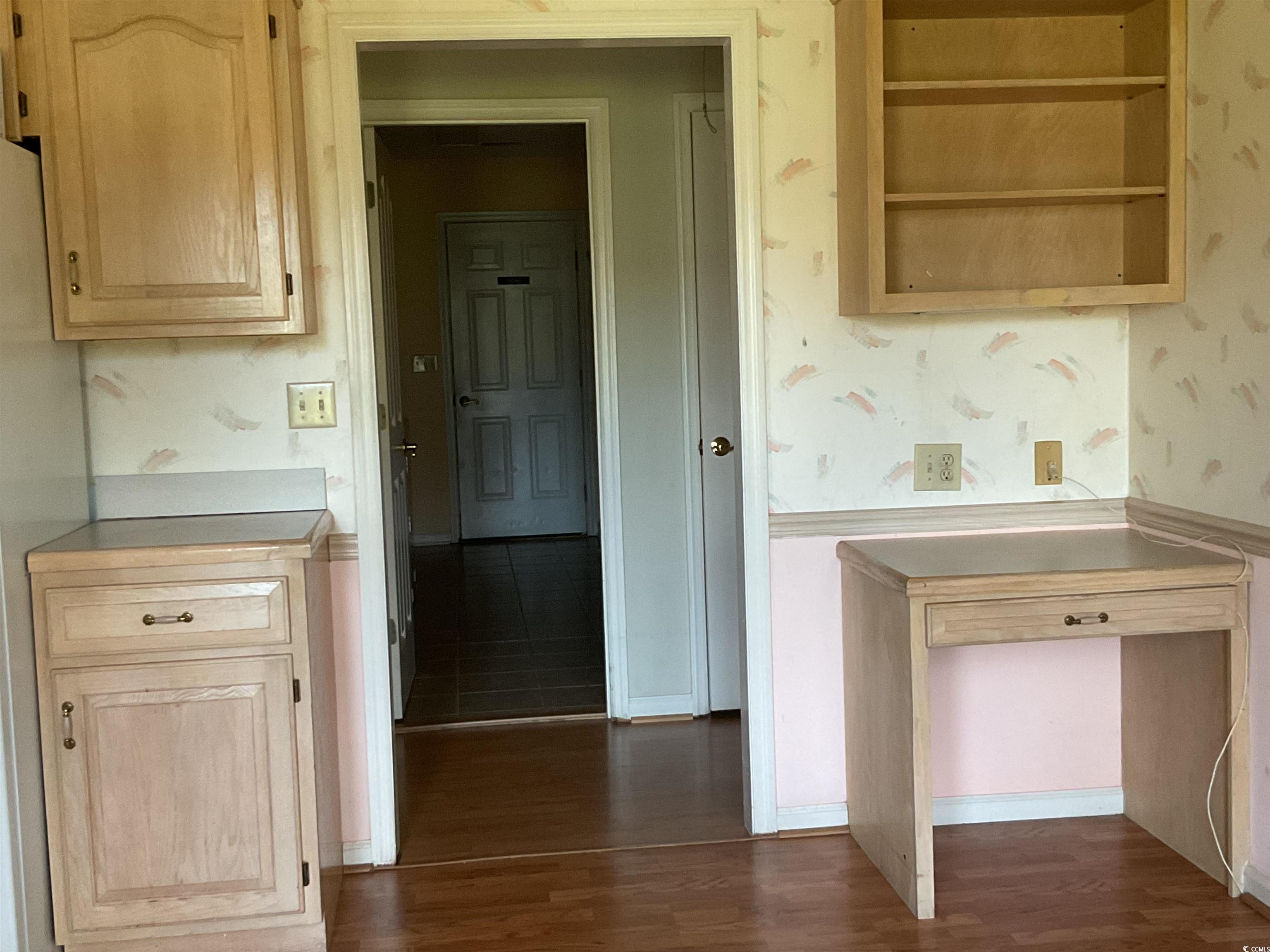 617 Waccamaw River Road Myrtle Beach, SC 29588 - Photo 7 of 17 Kitchen with light brown cabinets, dark wood-style