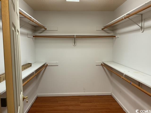 617 Waccamaw River Road Myrtle Beach, SC 29588 - Photo 10 of 17 Spacious closet featuring wood finished floors