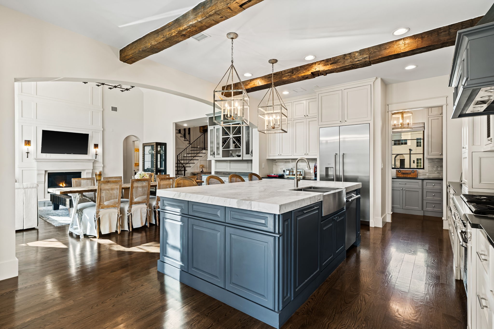 8307 Maple Court Bellaire, TX 77401 - Photo 12 of 30 a kitchen with lots of counter top space and stainless steel appliances