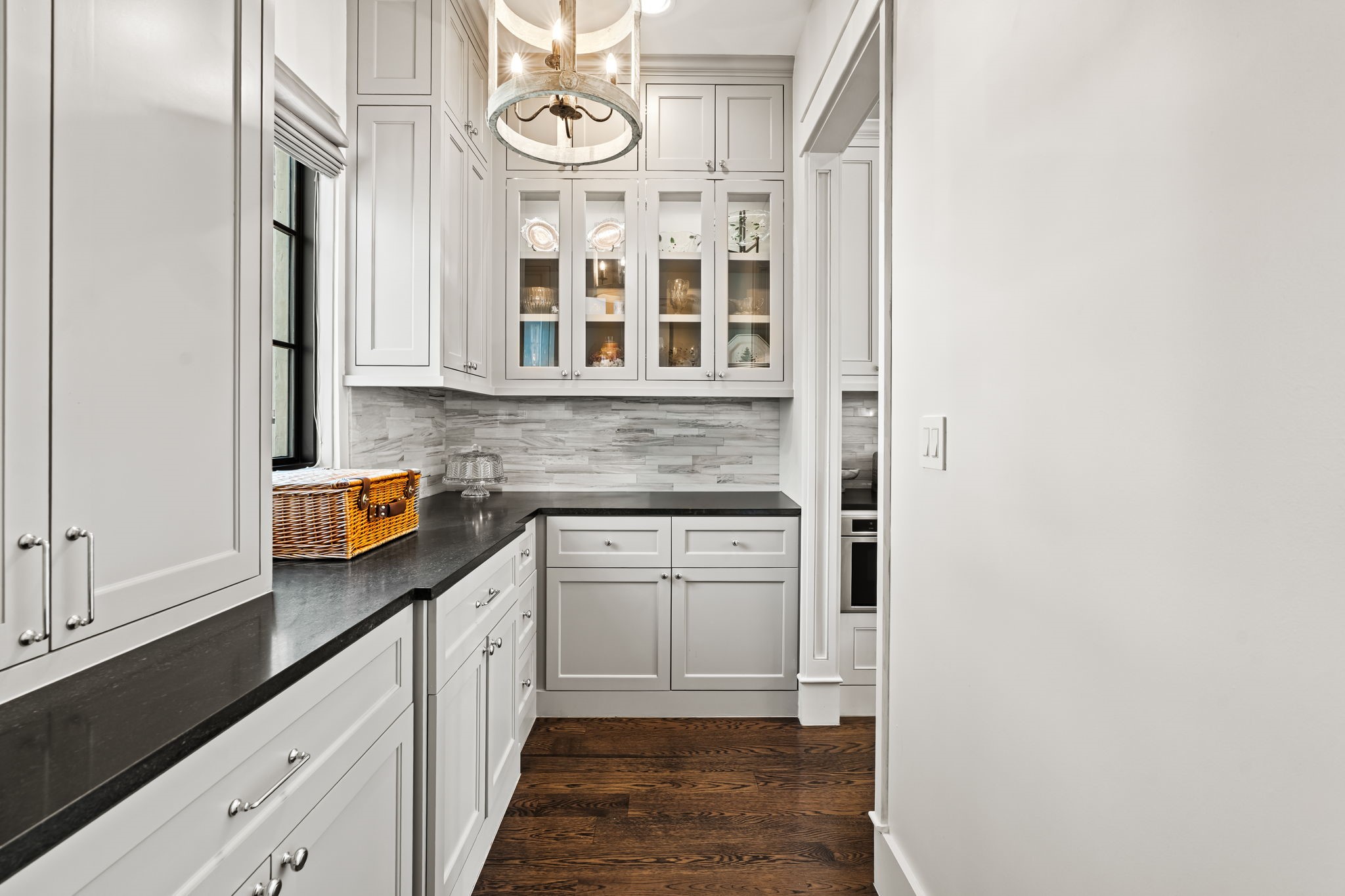 8307 Maple Court Bellaire, TX 77401 - Photo 13 of 30 a kitchen with stainless steel appliances granite countertop a stove and cabinets