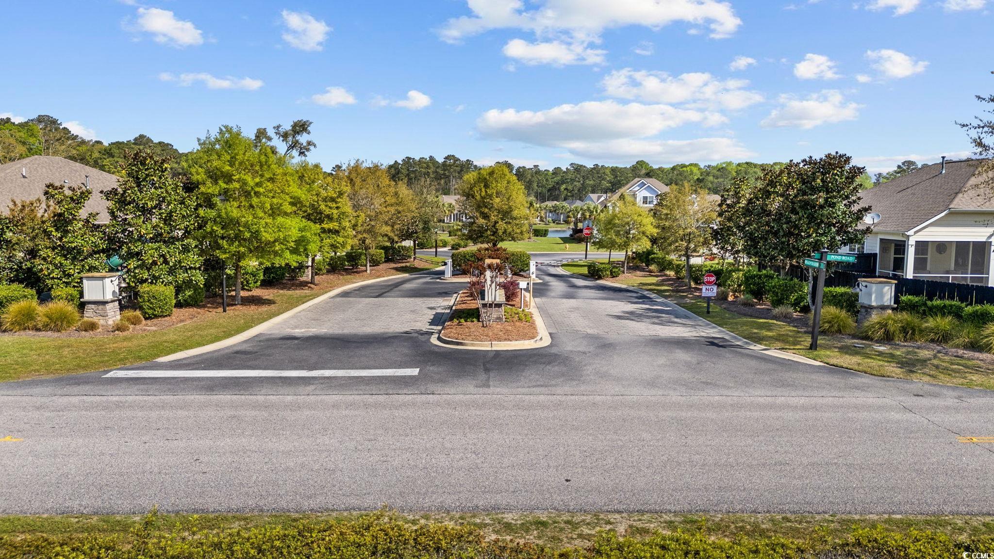 22 Salvia Court Murrells Inlet, SC 29576 - Photo 54 of 69 View of asphalt street with traffic signs