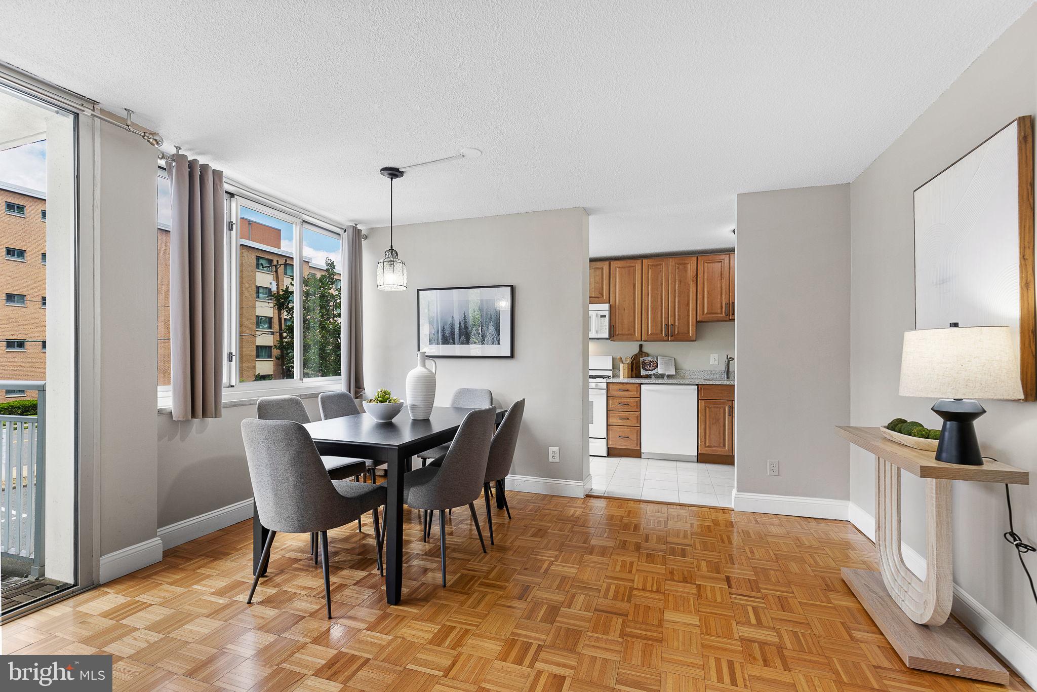 1301 South Arlington Ridge Road, Unit 208 Arlington, VA 22202 - Photo 12 of 23 a dining room with furniture and window