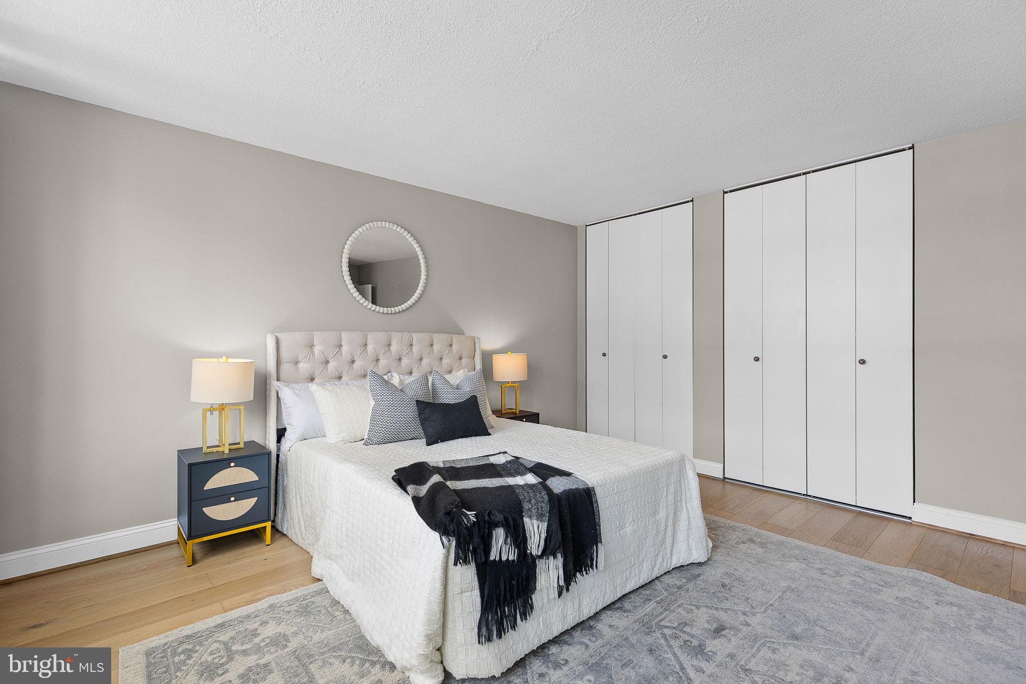 1301 South Arlington Ridge Road, Unit 208 Arlington, VA 22202 - Photo 18 of 23 a bedroom with a bed and a window