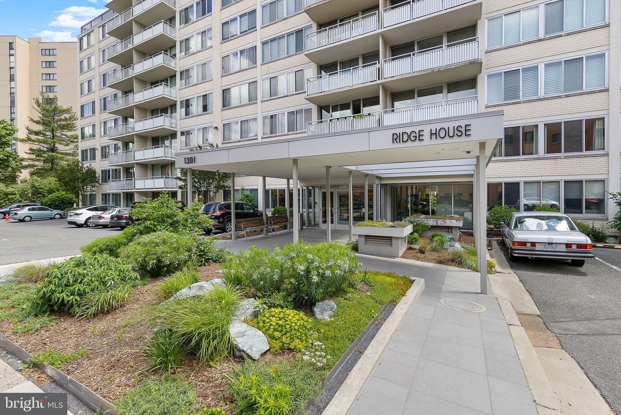 1301 South Arlington Ridge Road, Unit 208 Arlington, VA 22202 - Photo 6 of 23 a view of a building with sitting area