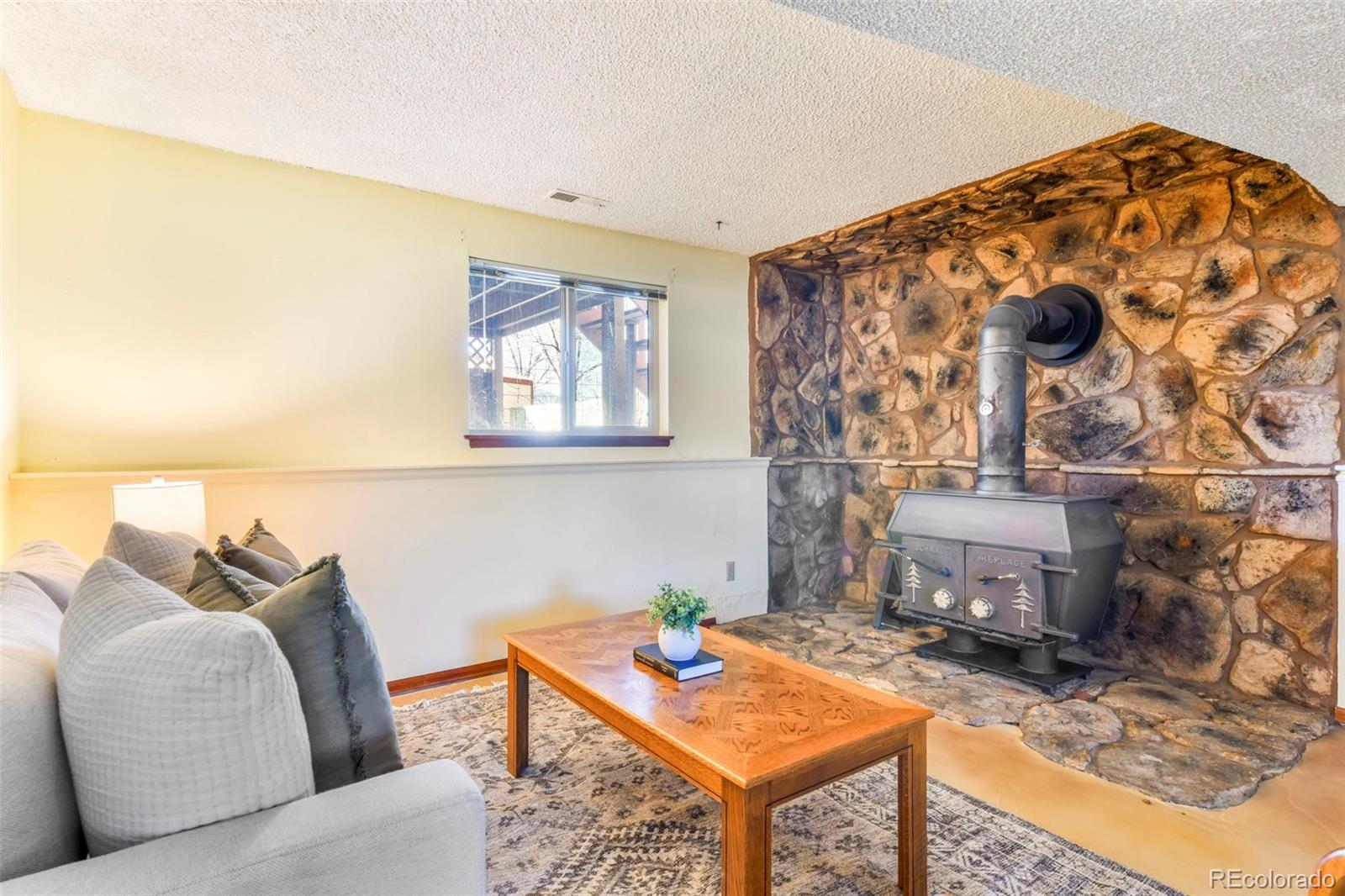 463 Washington Street Monument, CO 80132 - Photo 24 of 50 a living room with furniture and wooden floor