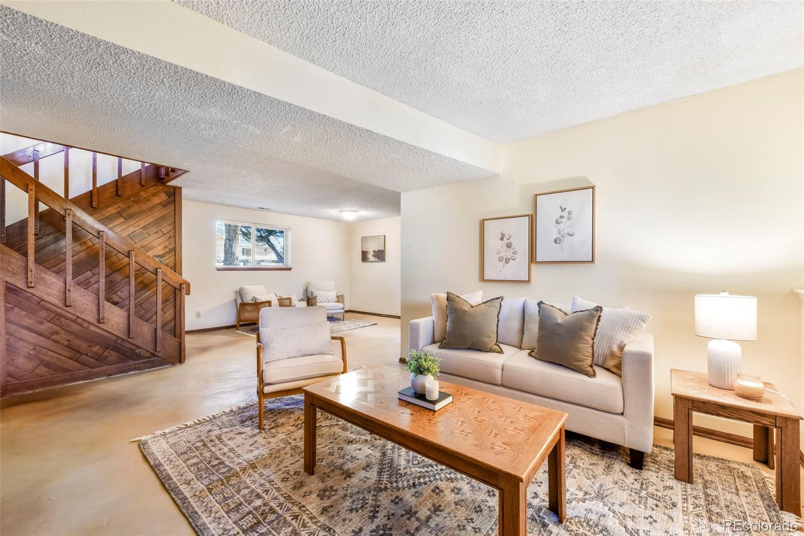 463 Washington Street Monument, CO 80132 - Photo 25 of 50 a living room with furniture and a rug