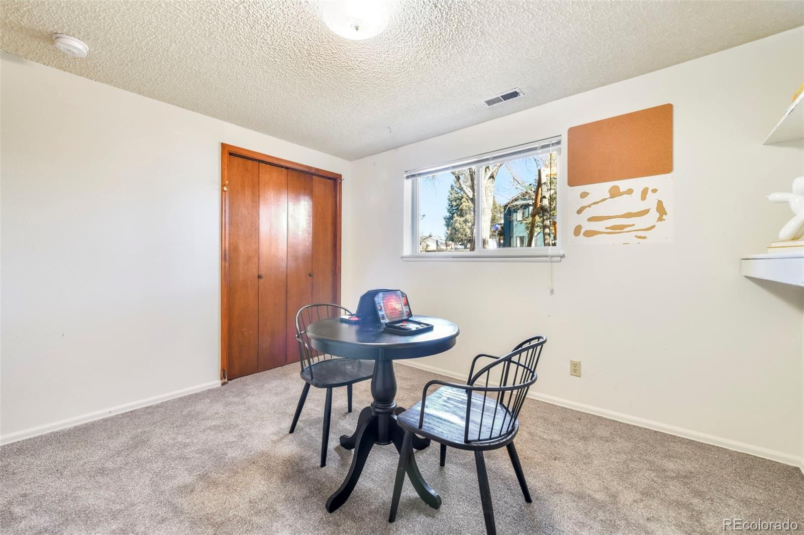 463 Washington Street Monument, CO 80132 - Photo 29 of 50 a view of a dining room with furniture and wooden floor