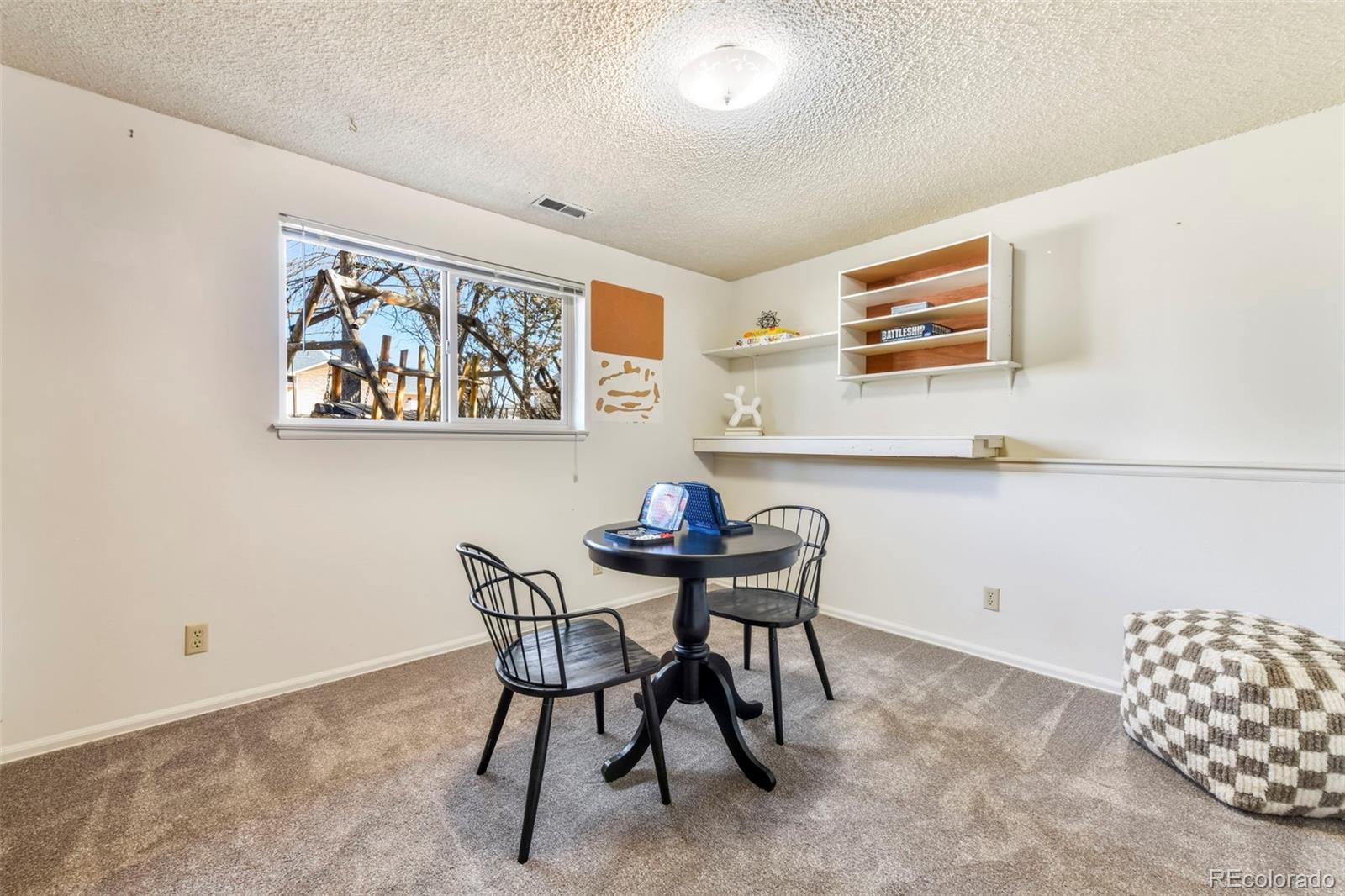 463 Washington Street Monument, CO 80132 - Photo 30 of 50 a view of a dining room with furniture