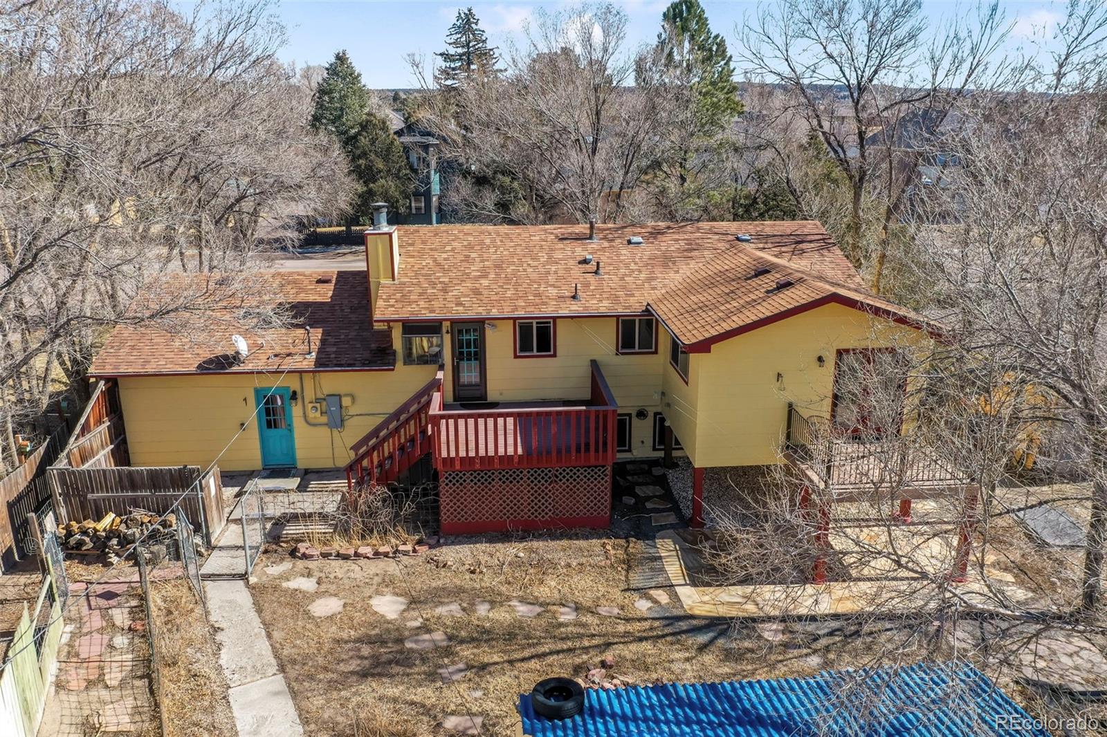 463 Washington Street Monument, CO 80132 - Photo 3 of 50 a aerial view of a house with a yard