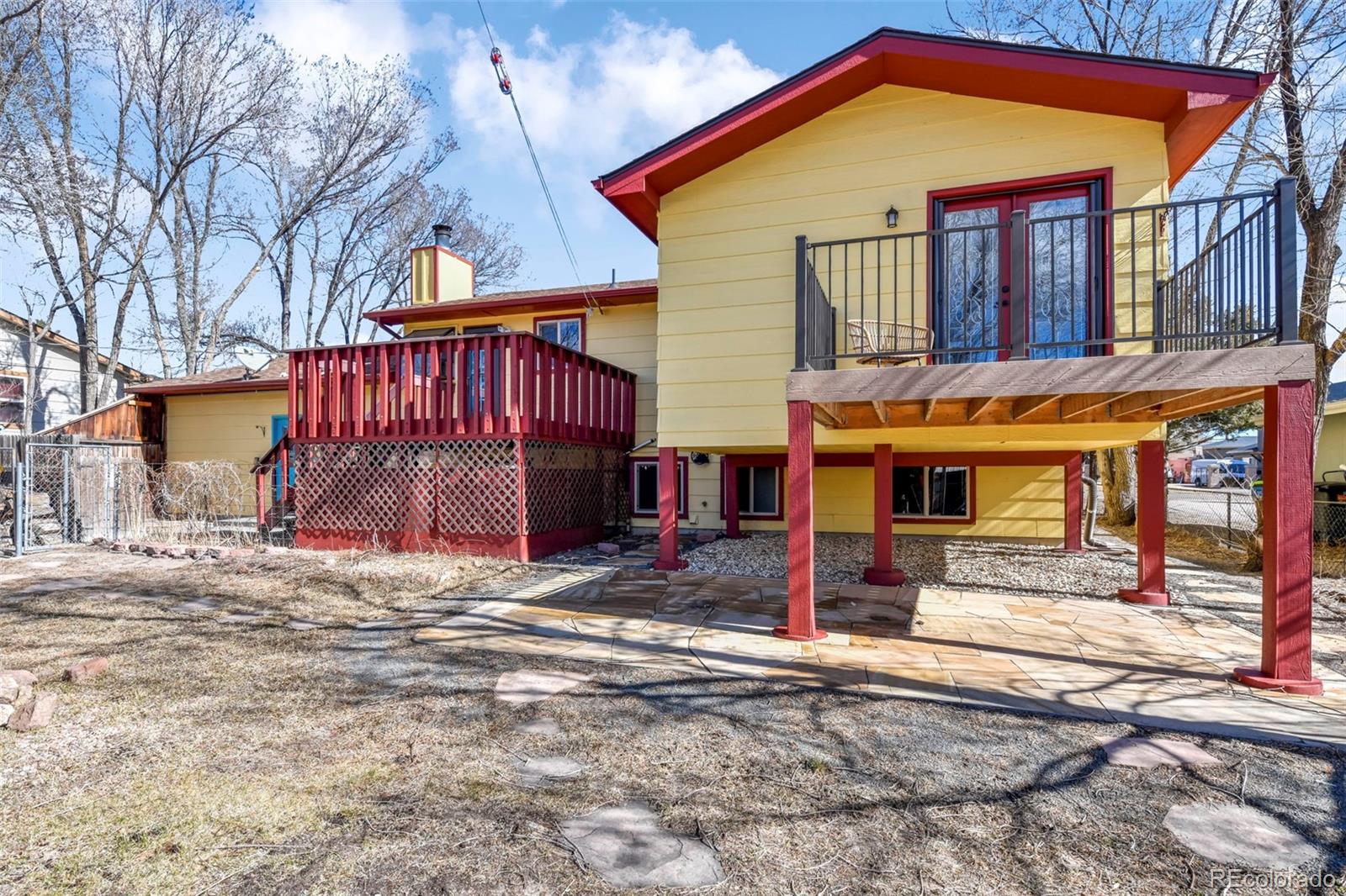 463 Washington Street Monument, CO 80132 - Photo 34 of 50 a view of a house with large space and a yard
