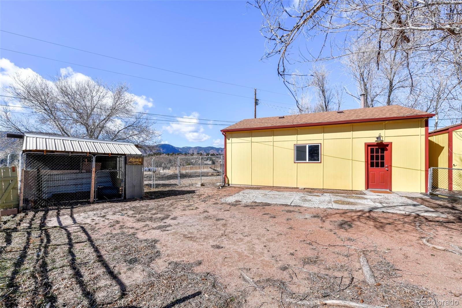 463 Washington Street Monument, CO 80132 - Photo 36 of 50 a front view of a house with a yard