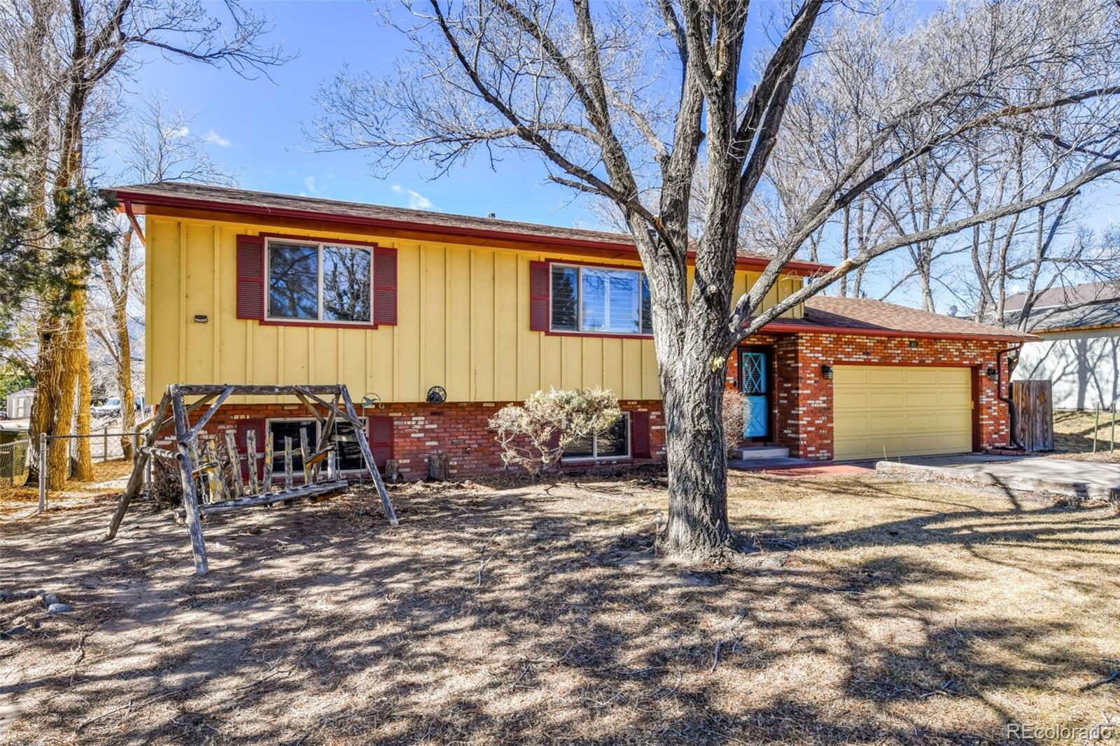 463 Washington Street Monument, CO 80132 - Photo 39 of 50 a front view of a house with garden