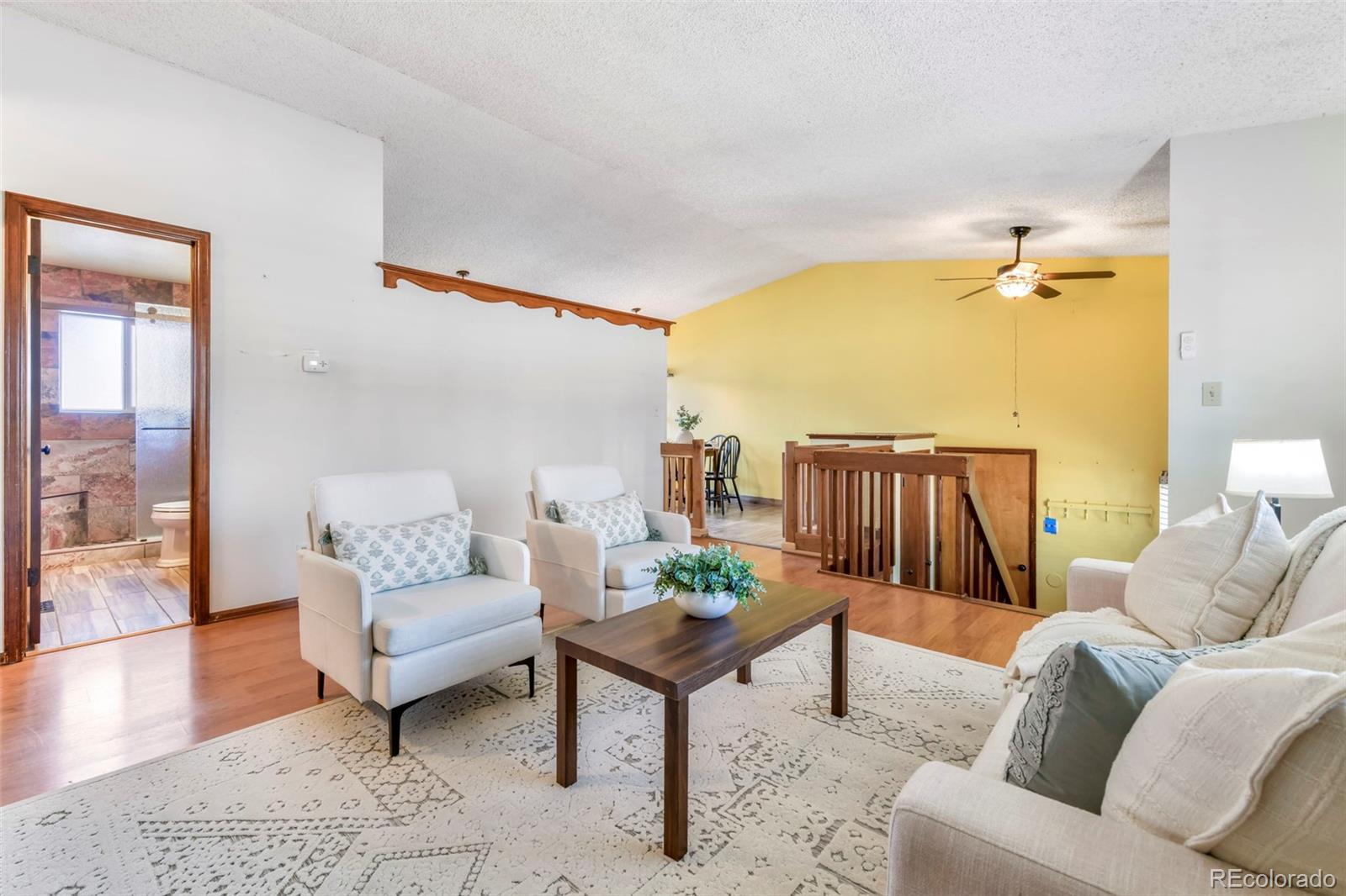 463 Washington Street Monument, CO 80132 - Photo 7 of 50 a living room with furniture and a table