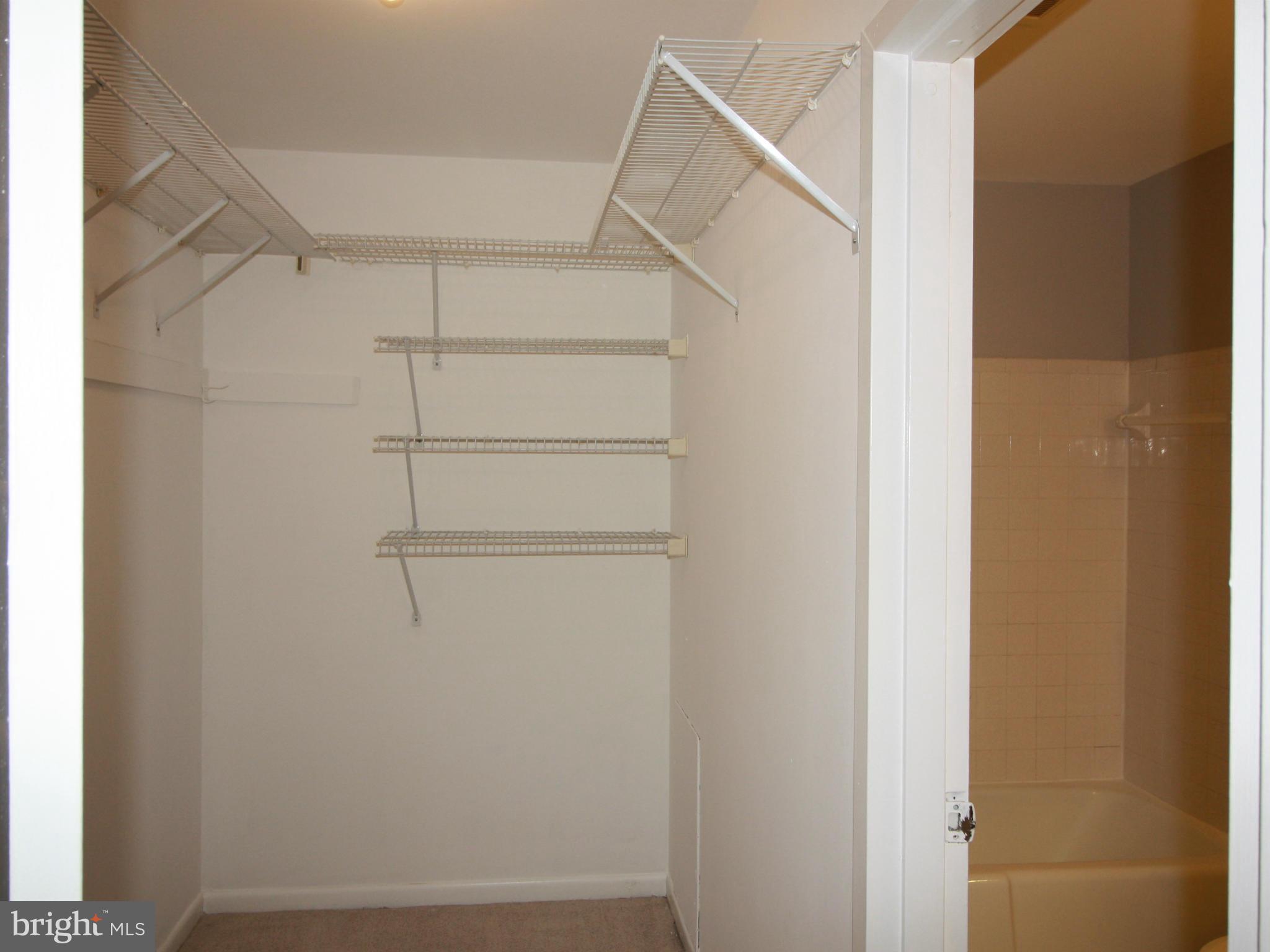 1425 Northgate Square, Unit 32B Reston, VA 20190 - Photo 16 of 28 Master walk-in closet