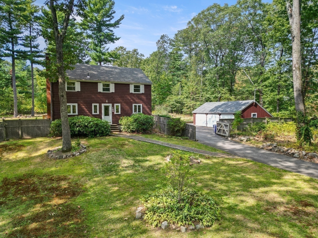 182 Georgetown Road Boxford, MA 01921 - Photo 1 of 41 a front view of a house with a yard