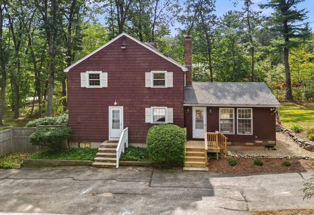 182 Georgetown Road Boxford, MA 01921 - Photo 4 of 41 a front view of a house with garden