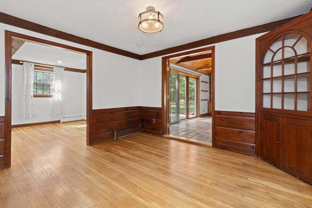182 Georgetown Road Boxford, MA 01921 - Photo 7 of 41 wooden floor and chair in a room