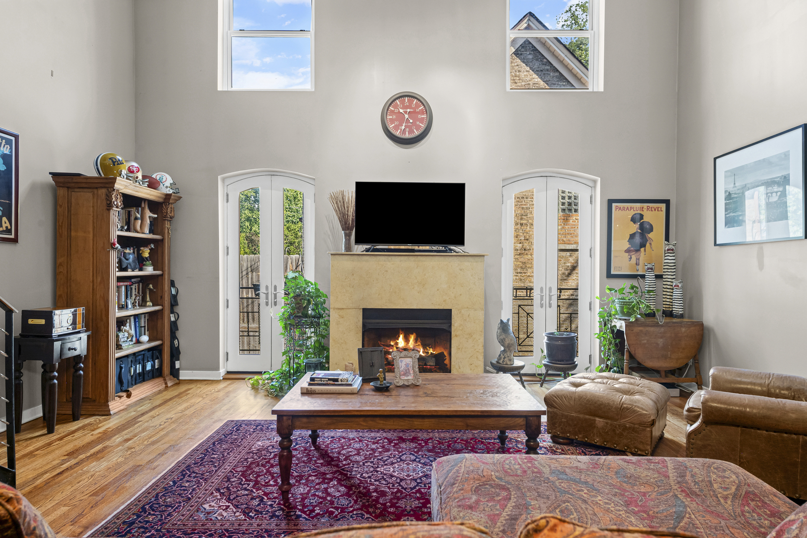 331 South Ridgeland Avenue, Unit B Oak Park, IL 60302 - Photo 7 of 20 a living room with furniture a bookshelf and a fireplace
