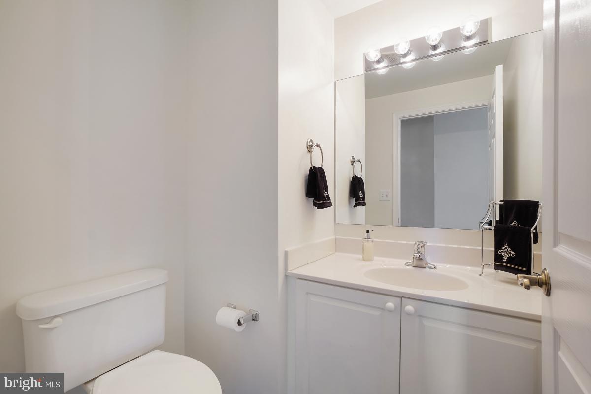 3100 North Leisure World Boulevard, Unit 1007 Silver Spring, MD 20906 - Photo 11 of 55 Half bath in the foyer