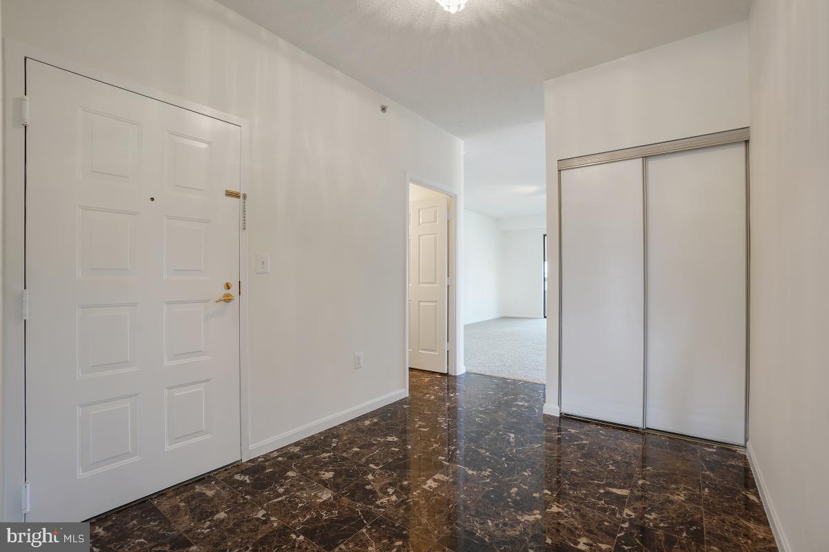 3100 North Leisure World Boulevard, Unit 1007 Silver Spring, MD 20906 - Photo 10 of 55 Spacious Foyer with hall closet