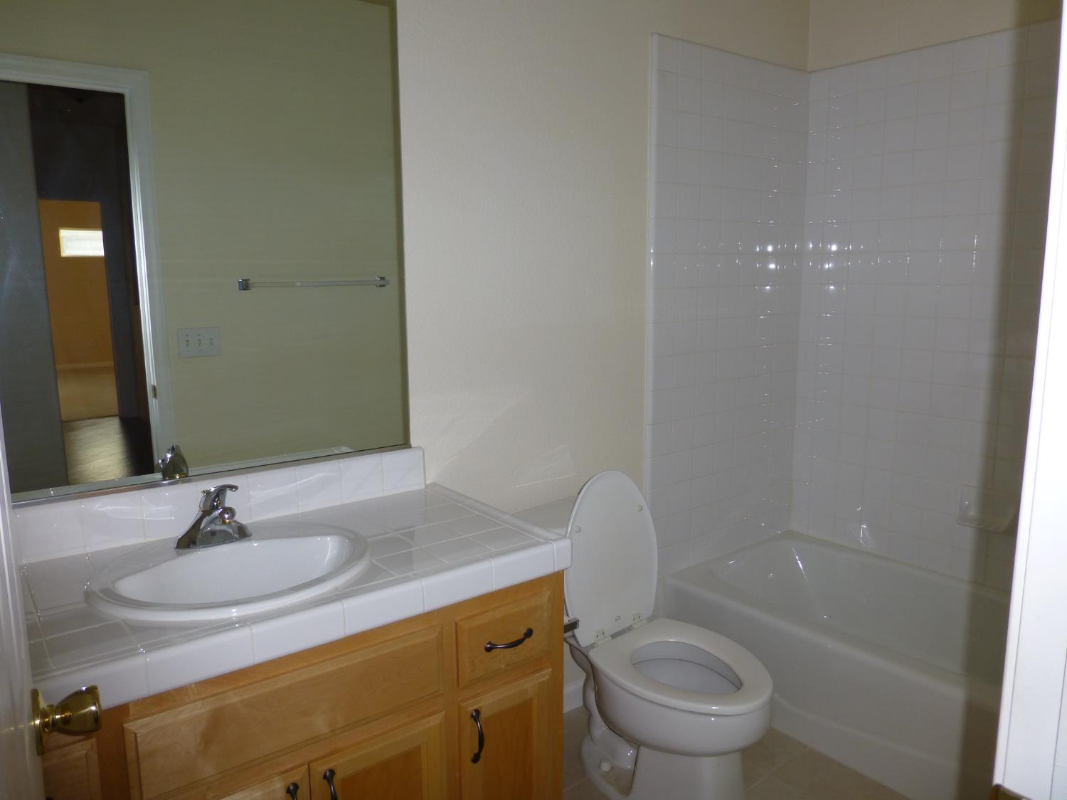 3532 Lauding Way Modesto, CA 95355 - Photo 15 of 21 a bathroom with a sink toilet and shower