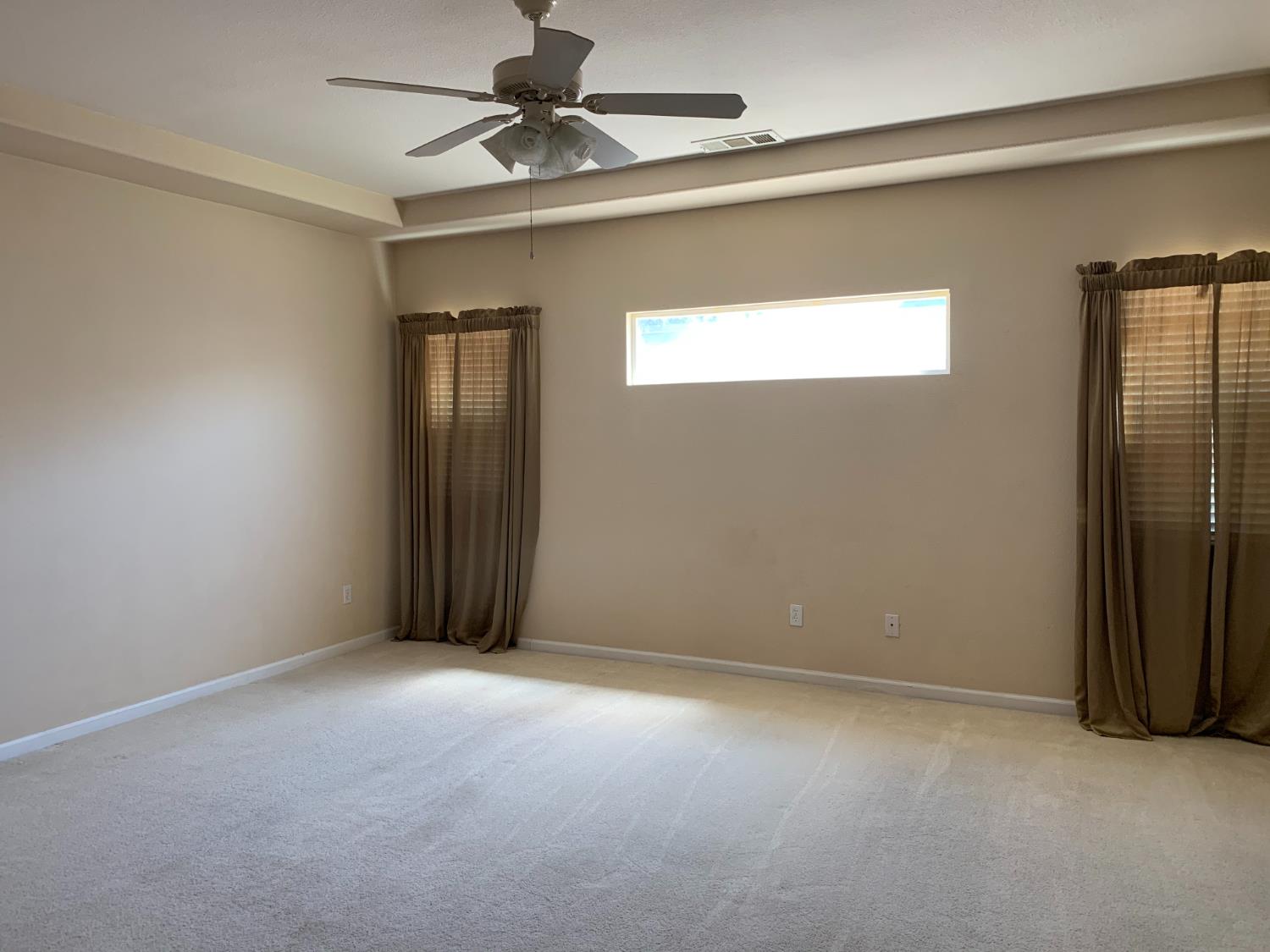 3532 Lauding Way Modesto, CA 95355 - Photo 10 of 21 a view of an empty room with a window