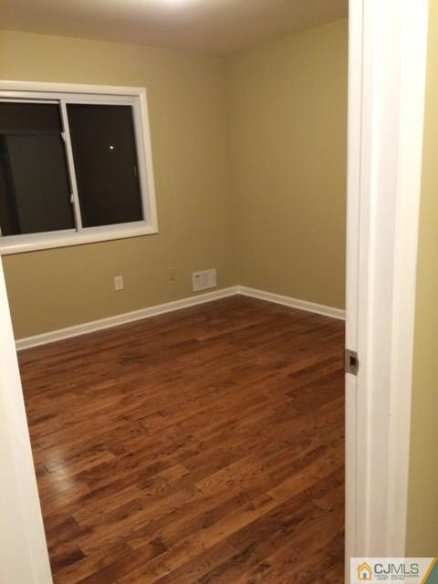12 Sinclair Road Edison, NJ 08820 - Photo 13 of 18 a view of an empty room