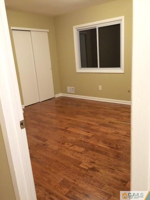 12 Sinclair Road Edison, NJ 08820 - Photo 17 of 18 a view of an empty room