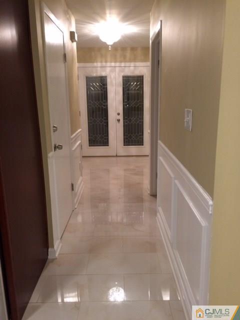 12 Sinclair Road Edison, NJ 08820 - Photo 18 of 18 a view of a hallway