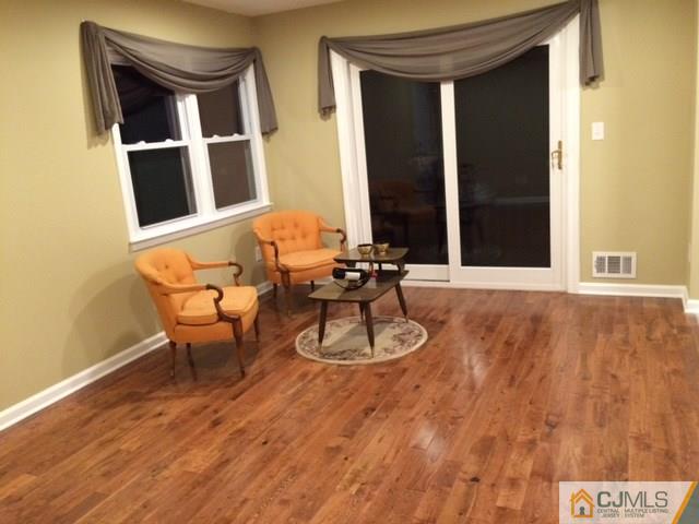 12 Sinclair Road Edison, NJ 08820 - Photo 6 of 18 a view of a chairs and table in a patio