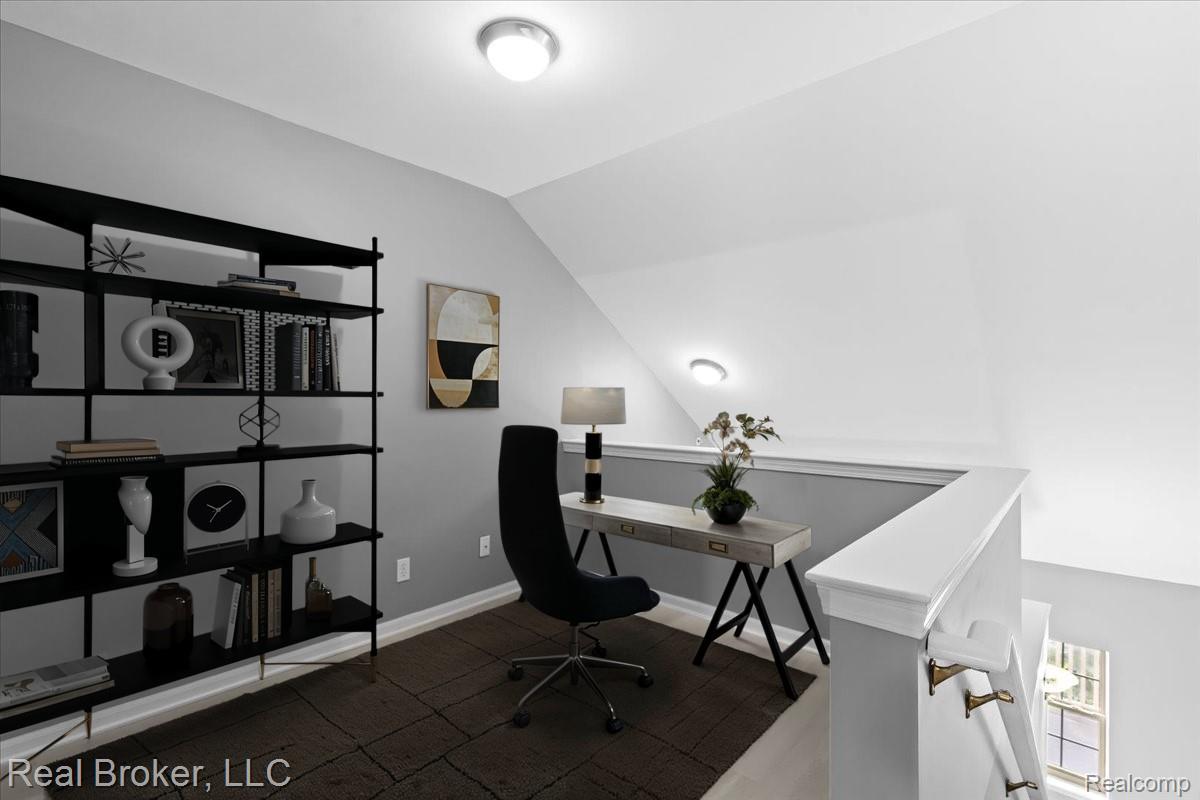 1546 Devon Lane Troy, MI 48084 - Photo 7 of 46 Staged Loft Office space featuring vaulted ceiling and baseboards