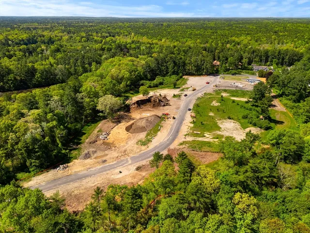 a view of a lake with a yard