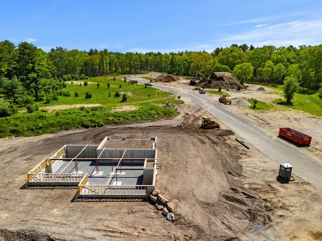 a view of a swimming pool with a yard