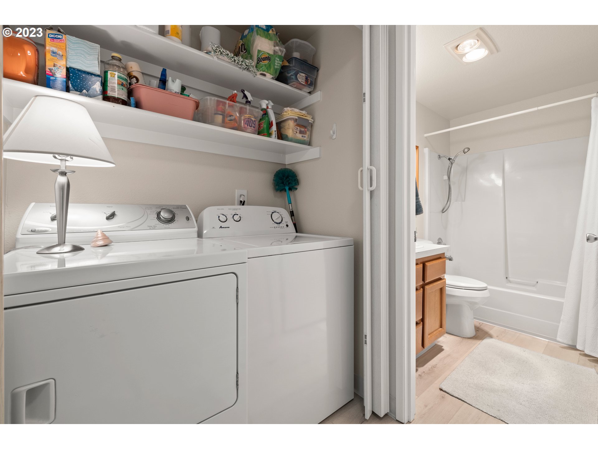 8720 Southwest Tualatin Road, Unit 321 Tualatin, OR 97062 - Photo 19 of 21 a en suite bathroom with a sink a toilet and shower