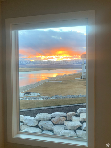 21 Pier Place Tooele, UT 84074 - Photo 109 of 112 Expansive window framing a mountain and lake backdrop