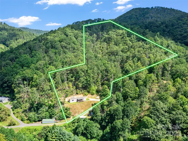 a view of a yard from a balcony